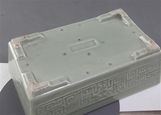 A Chinese celadon glazed narcissus jardiniere, impressed Qianlong mark, 19th century, 23.5cm